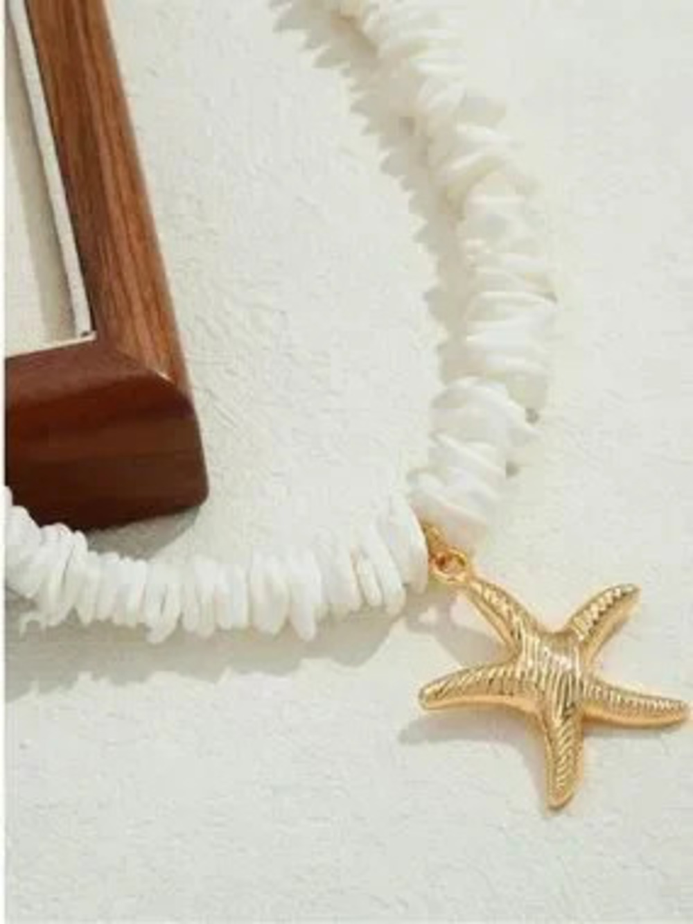 Anthropologie White Shell Chip Necklace with Gold Starfish Charm